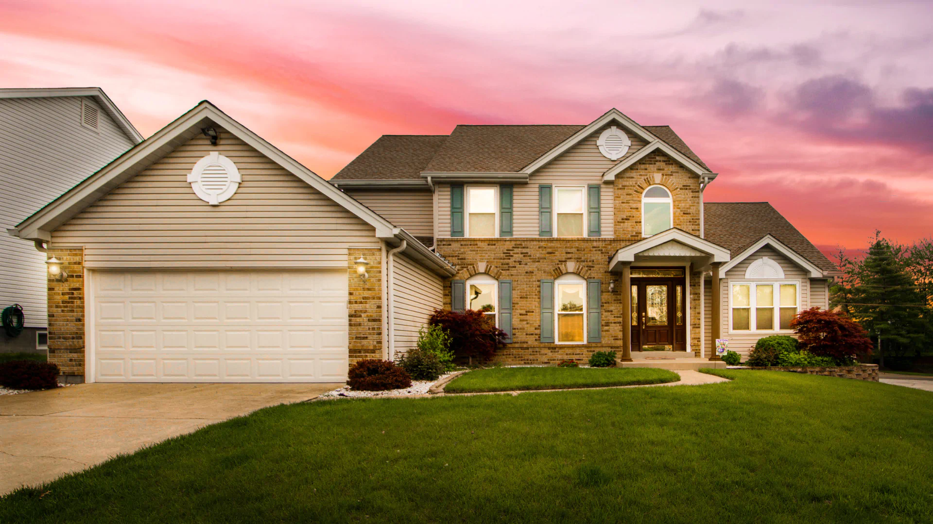 two storey residential house with wide front yard